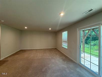 view of carpeted spare room