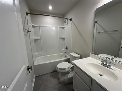 full bathroom with toilet, vanity, and shower / bathing tub combination