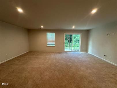 empty room with carpet flooring