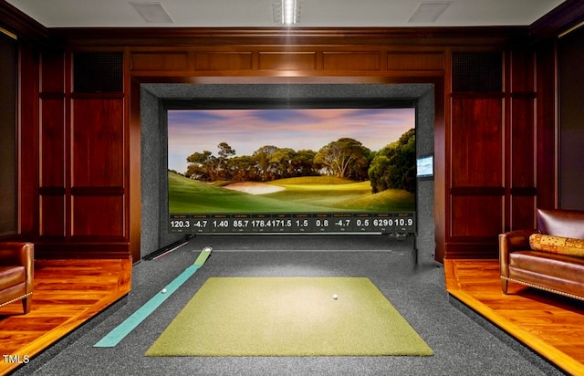 recreation room with golf simulator