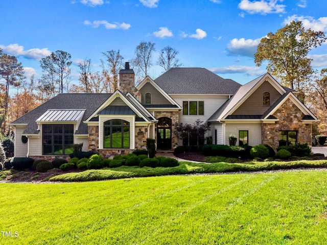 view of front of home with a front yard