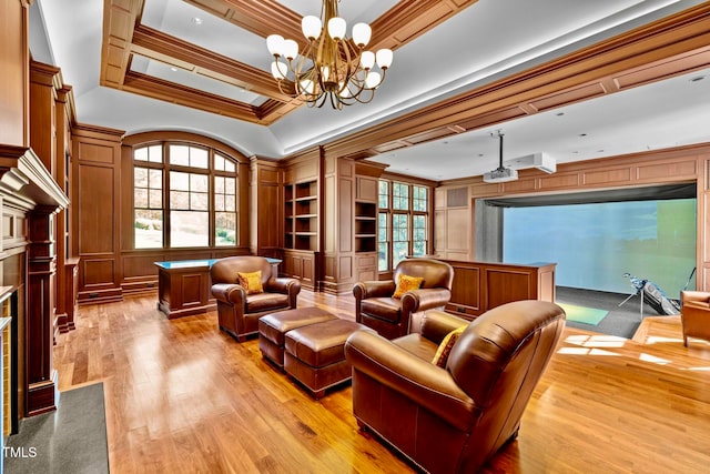 interior space with light wood-type flooring, crown molding, and an inviting chandelier