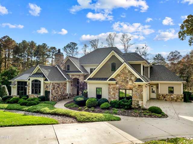 craftsman inspired home with a garage