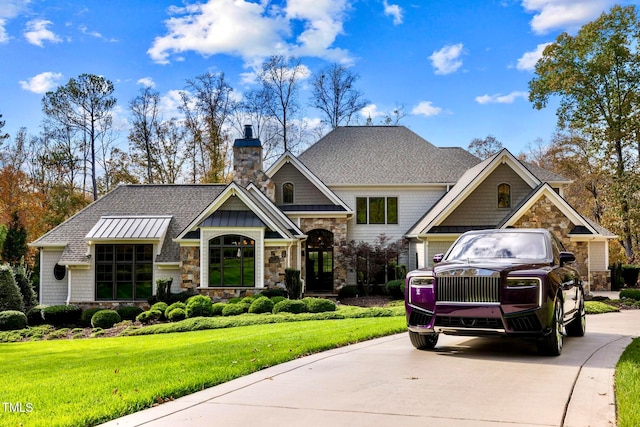 view of front of property with a front lawn