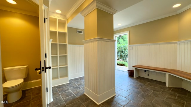 bathroom with toilet and ornamental molding