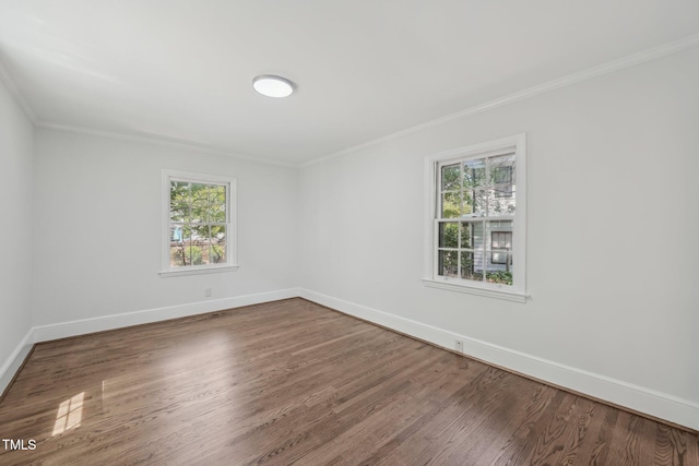 1316 Glenwood Ave, Raleigh, NC 27605 - unfurnished room featuring baseboards, ornamental molding, and wood finished floors