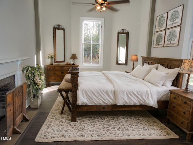 bedroom featuring dark wood-type flooring and ceiling fan