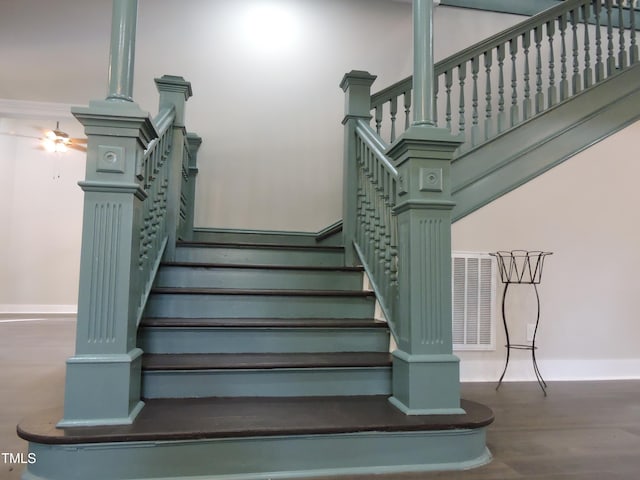 stairway with wood-type flooring