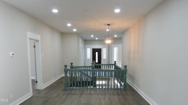 hallway featuring dark wood-type flooring