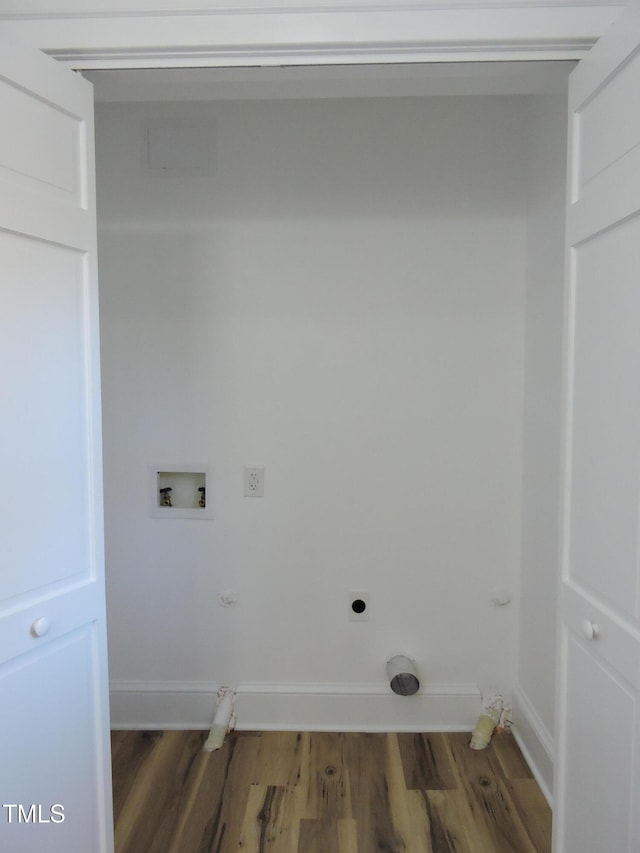 washroom featuring hookup for an electric dryer, dark hardwood / wood-style flooring, and washer hookup