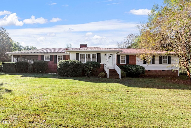 single story home featuring a front lawn