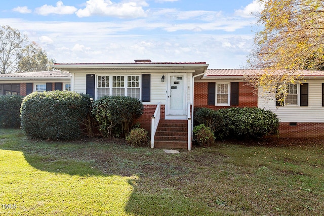 ranch-style home featuring a front lawn