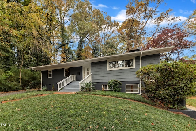 view of front of house with a front lawn