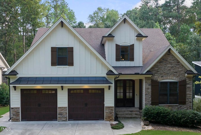 view of front of property with a garage