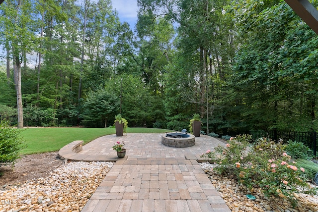 view of patio featuring a fire pit