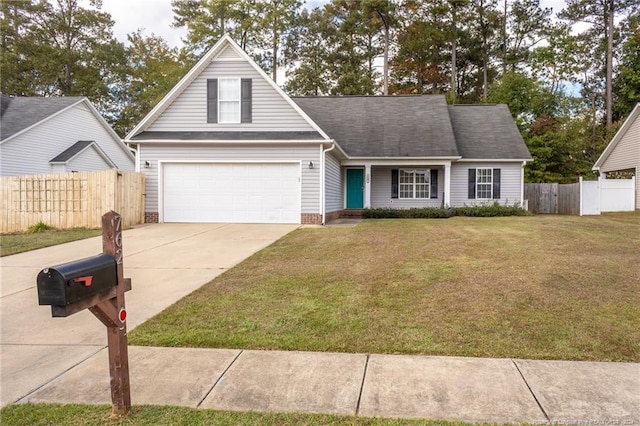 view of front facade with a front lawn and a garage