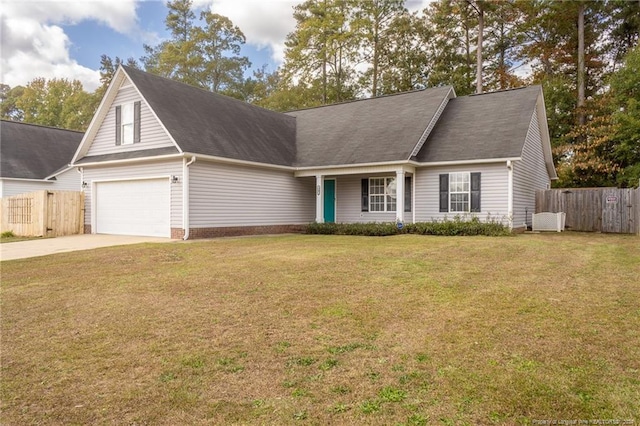 view of front facade featuring a garage and a front yard