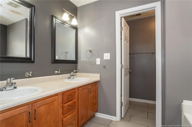 bathroom featuring vanity and tile patterned floors