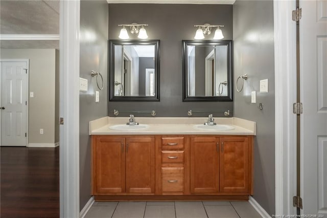 bathroom with vanity and tile patterned floors