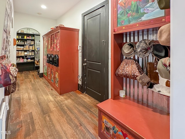 mudroom with hardwood / wood-style floors