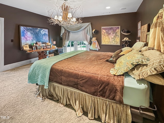 carpeted bedroom with a chandelier