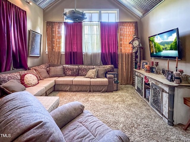 living room featuring carpet floors and lofted ceiling