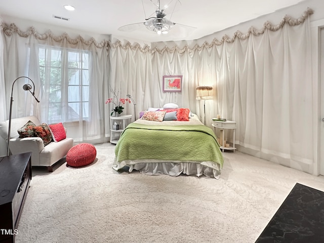 bedroom with carpet floors and ceiling fan