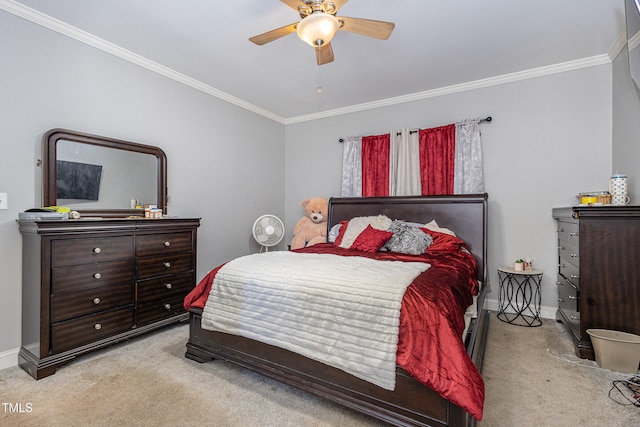 bedroom with crown molding, ceiling fan, and light carpet