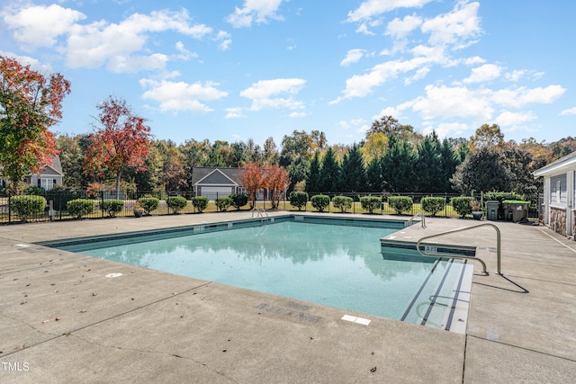 view of pool featuring a patio