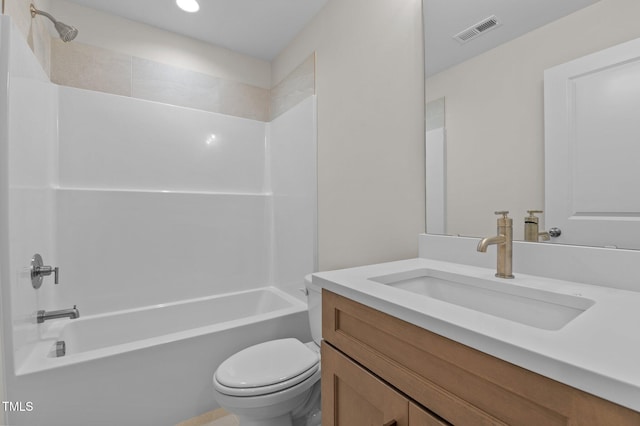 full bathroom featuring shower / bath combination, vanity, and toilet