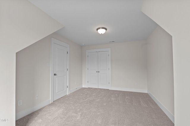 additional living space with carpet flooring