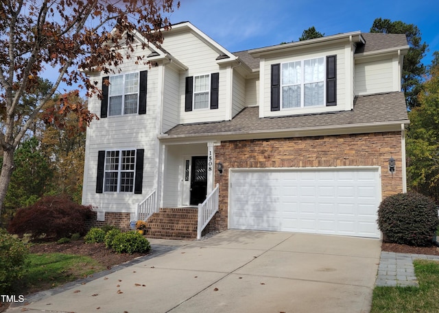 view of front of property featuring a garage