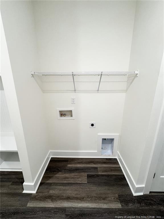 clothes washing area featuring hookup for an electric dryer, dark wood-type flooring, and washer hookup