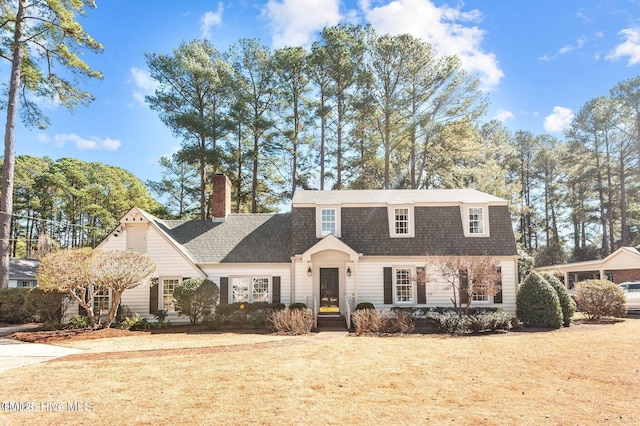 view of front of home with a front yard