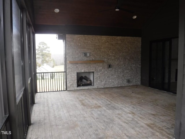 interior space with a stone fireplace