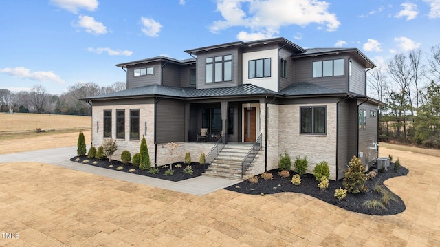 prairie-style home with covered porch