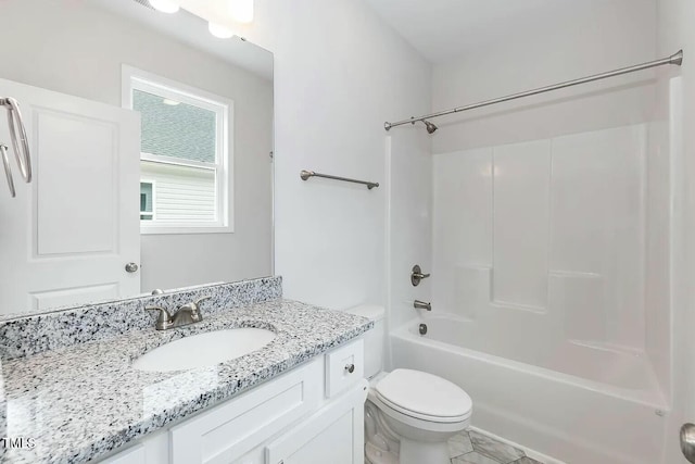 full bathroom with shower / washtub combination, vanity, and toilet