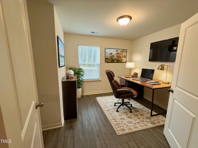 home office featuring dark hardwood / wood-style flooring