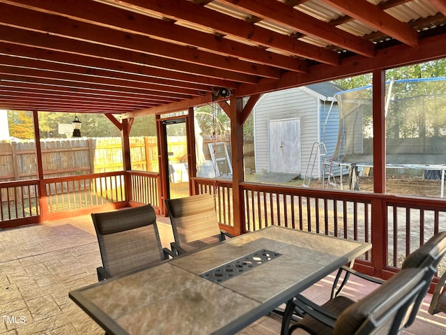 deck featuring a patio and a trampoline