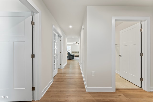 hall featuring light hardwood / wood-style flooring