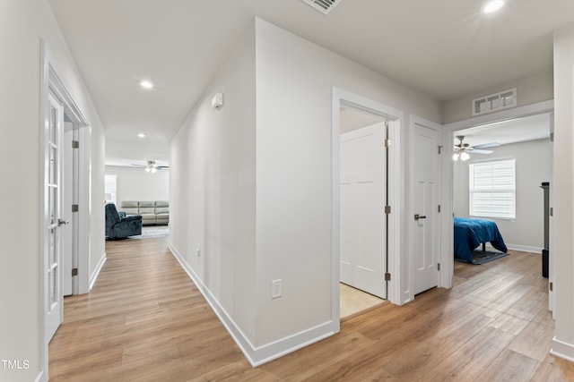 hall featuring light hardwood / wood-style floors