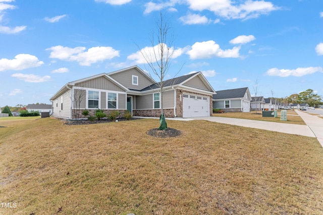 view of front of home with a garage and a front yard