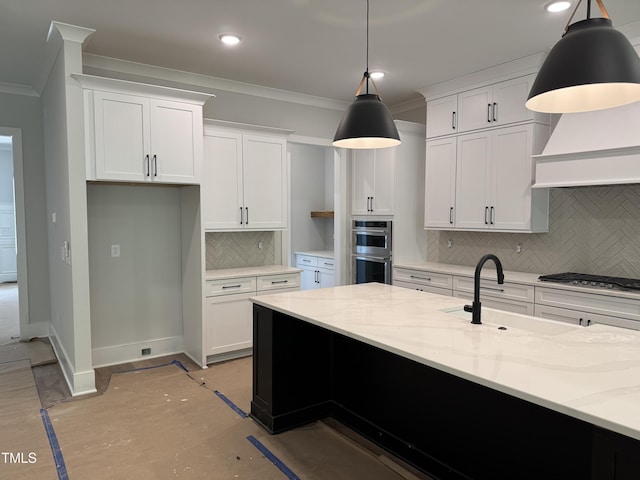 122 Sanderway Dr, Chapel Hill, NC 27516 - kitchen featuring ornamental molding, decorative backsplash, appliances with stainless steel finishes, white cabinets, and light stone counters