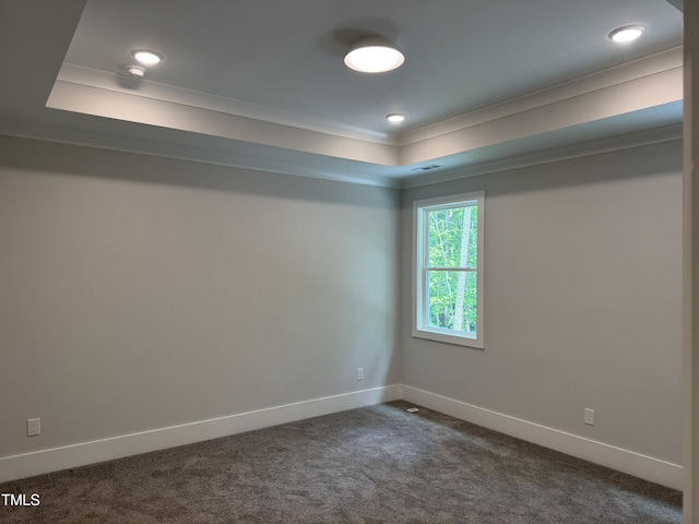 122 Sanderway Dr, Chapel Hill, NC 27516 - empty room featuring a tray ceiling, dark carpet, crown molding, and recessed lighting