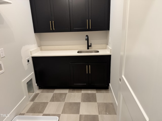 122 Sanderway Dr, Chapel Hill, NC 27516 - laundry area featuring cabinet space, electric dryer hookup, and light flooring