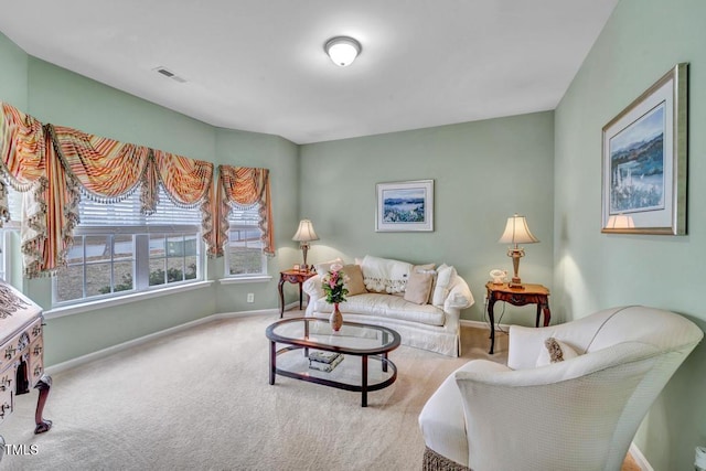 living room with light colored carpet