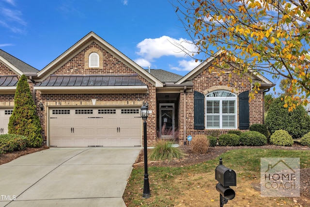 view of front of property with a garage