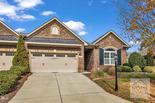 view of front of home with a garage