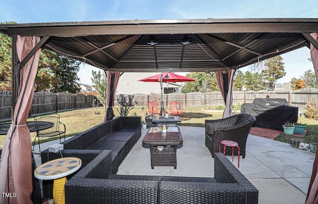 view of patio / terrace with a gazebo, an outdoor hangout area, and grilling area