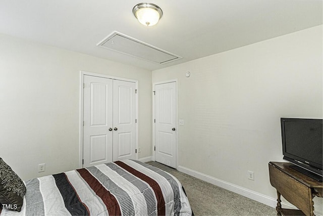 carpeted bedroom with a closet